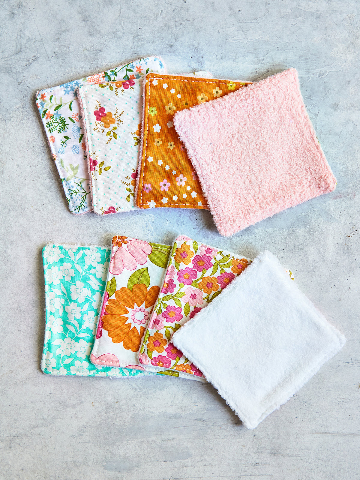 Set of 8 Reusable Facial Cleansing Pads. Eco Friendly Soft Microfiber Fleece And Cotton. Machine Washable. Mesh Laundry Bag Included.