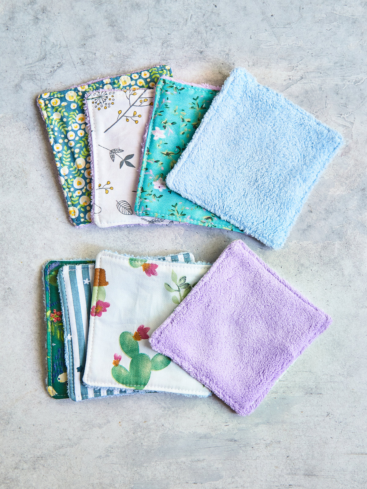 Set of 8 Reusable Facial Cleansing Pads. Eco Friendly Soft Microfiber Fleece And Cotton. Machine Washable. Mesh Laundry Bag Included.