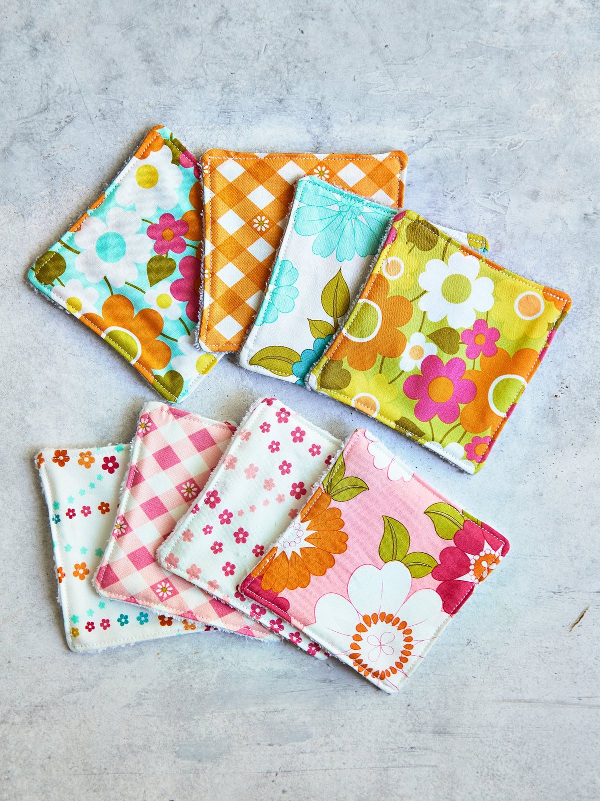 Set of 8 Reusable Facial Cleansing Pads.  Eco Friendly Soft Microfiber Fleece And Cotton. Machine Washable. Mesh Laundry Bag Included.