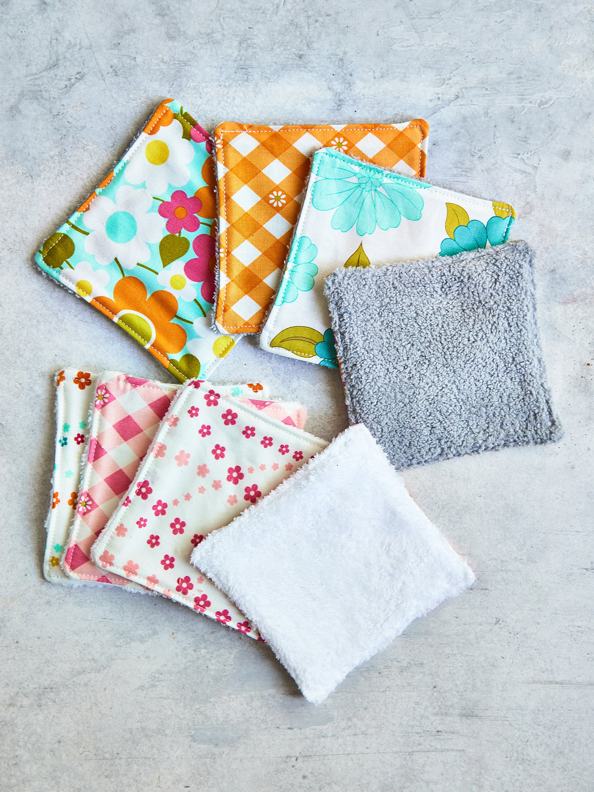 Set of 8 Reusable Facial Cleansing Pads.  Eco Friendly Soft Microfiber Fleece And Cotton. Machine Washable. Mesh Laundry Bag Included.