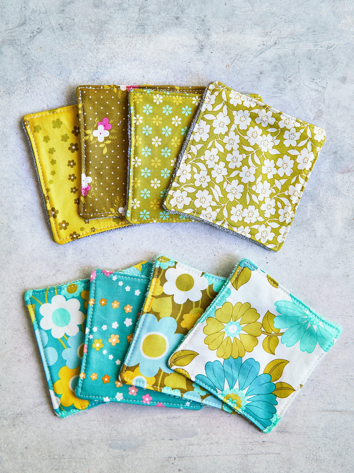 Set of 8 Reusable Facial Cleansing Pads.  Eco Friendly Soft Microfiber Fleece And Cotton. Machine Washable. Mesh Laundry Bag Included.