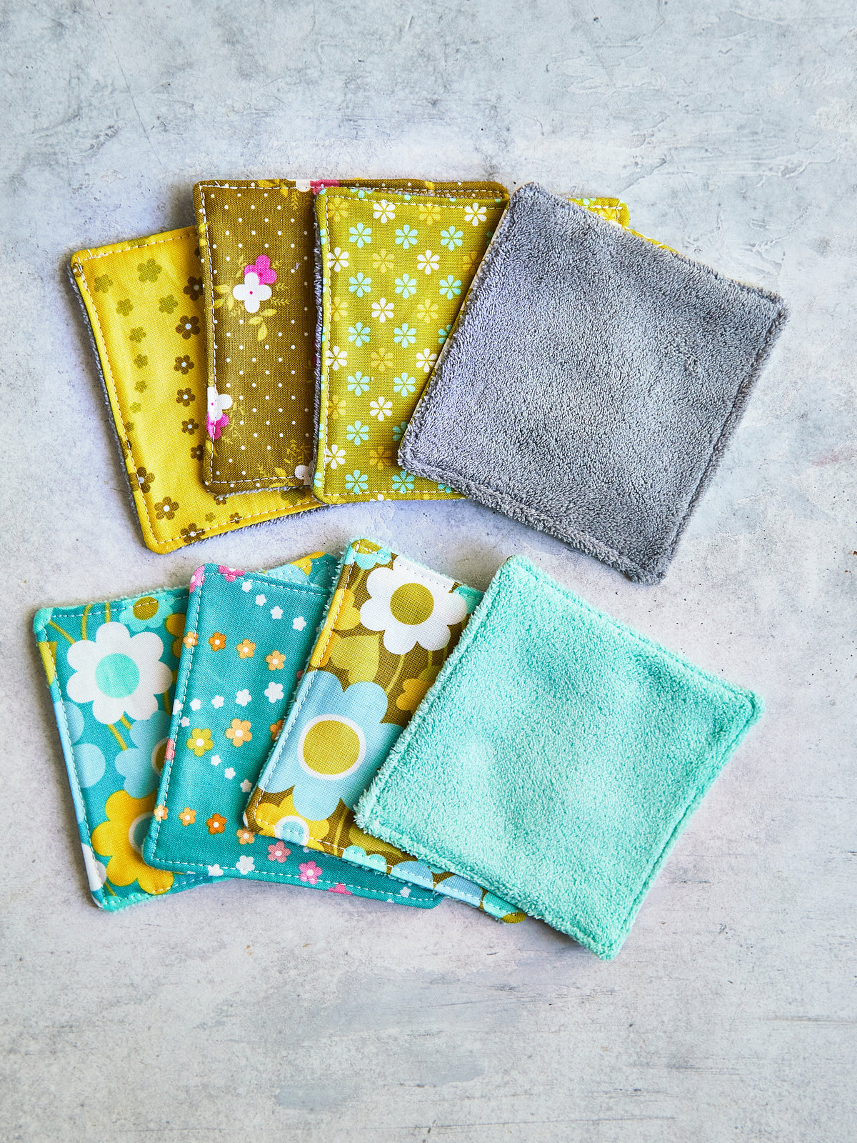 Set of 8 Reusable Facial Cleansing Pads.  Eco Friendly Soft Microfiber Fleece And Cotton. Machine Washable. Mesh Laundry Bag Included.