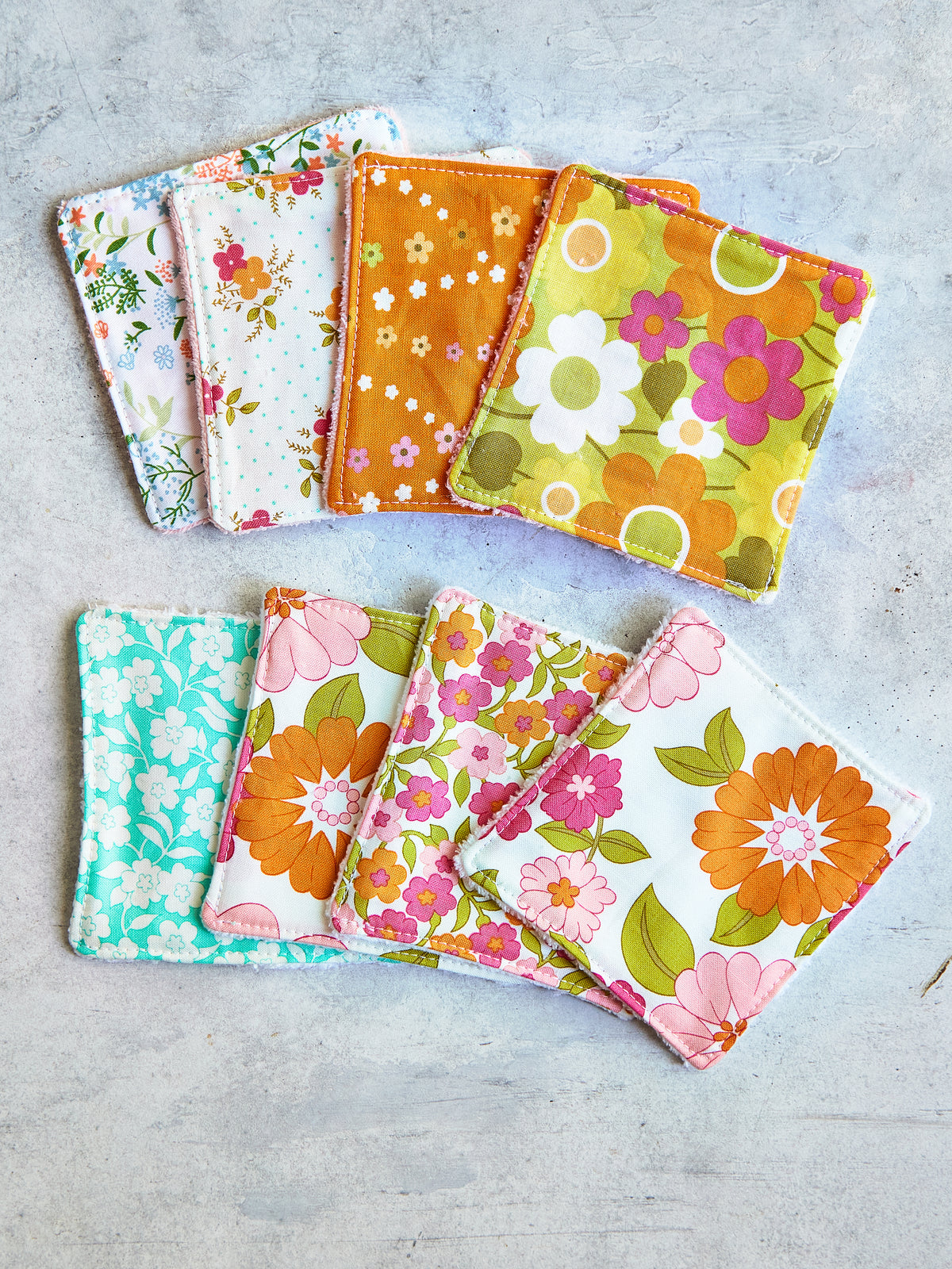 Set of 8 Reusable Facial Cleansing Pads.  Eco Friendly Soft Microfiber Fleece And Cotton. Machine Washable. Mesh Laundry Bag Included.